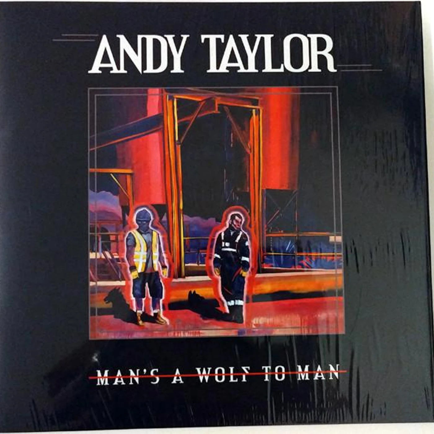 Andy Taylor MAN'S A WOLF TO MAN Vinyl Record