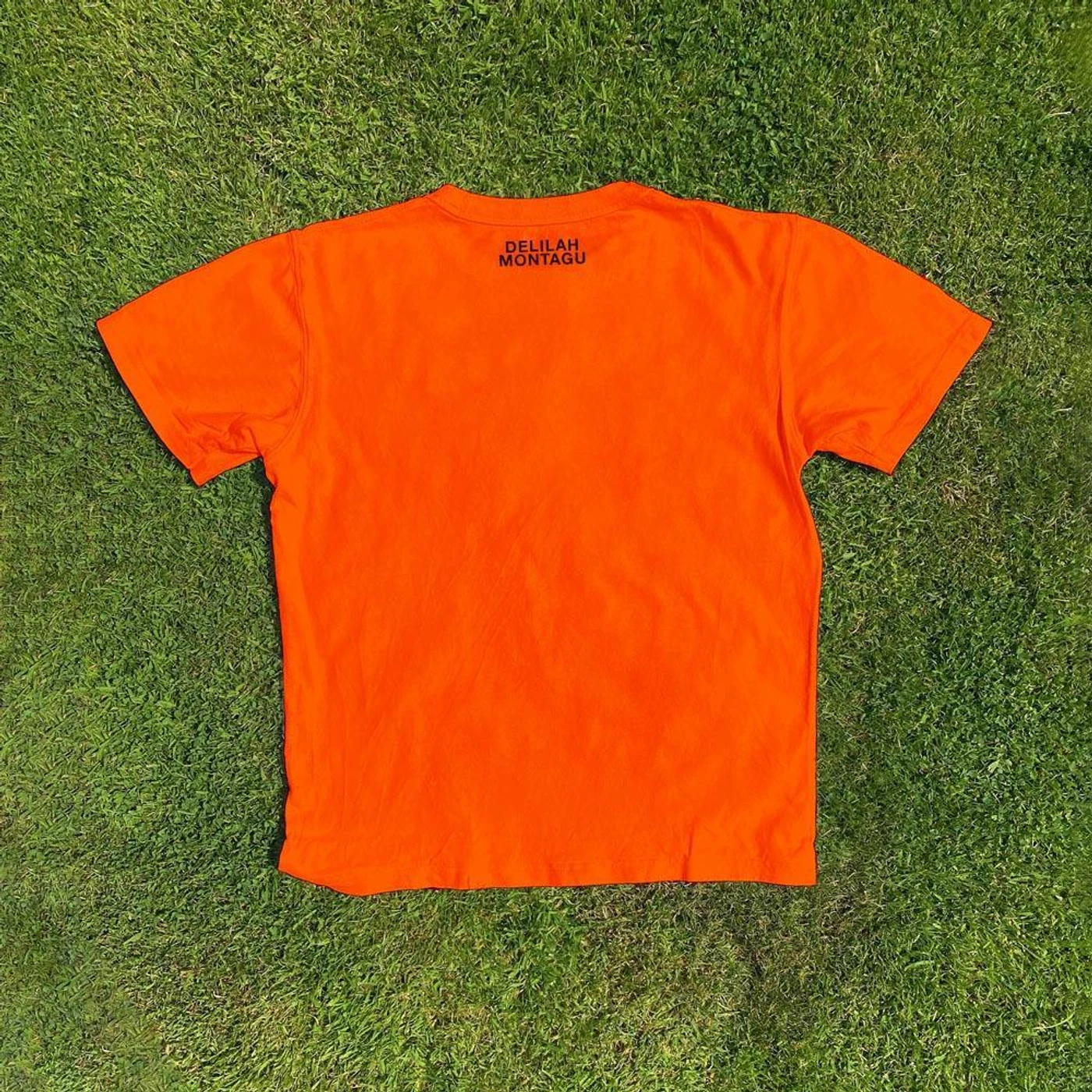 Delilah Montagu Portrait Orange Tee