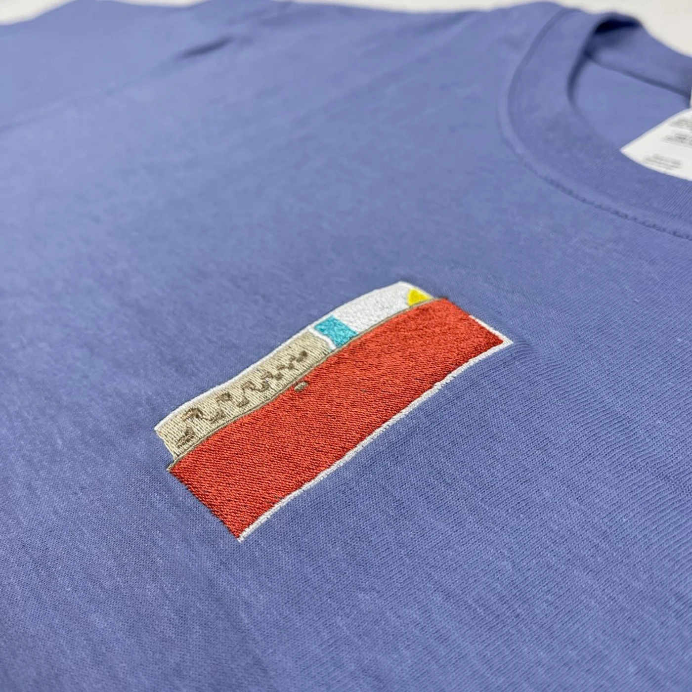 Surfaces Door Tee