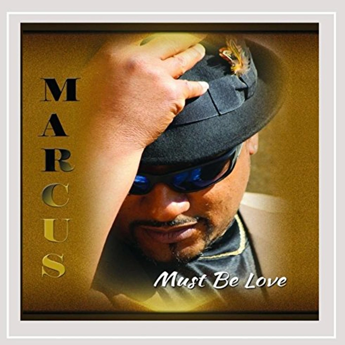 Marcus MUST BE LOVE CD