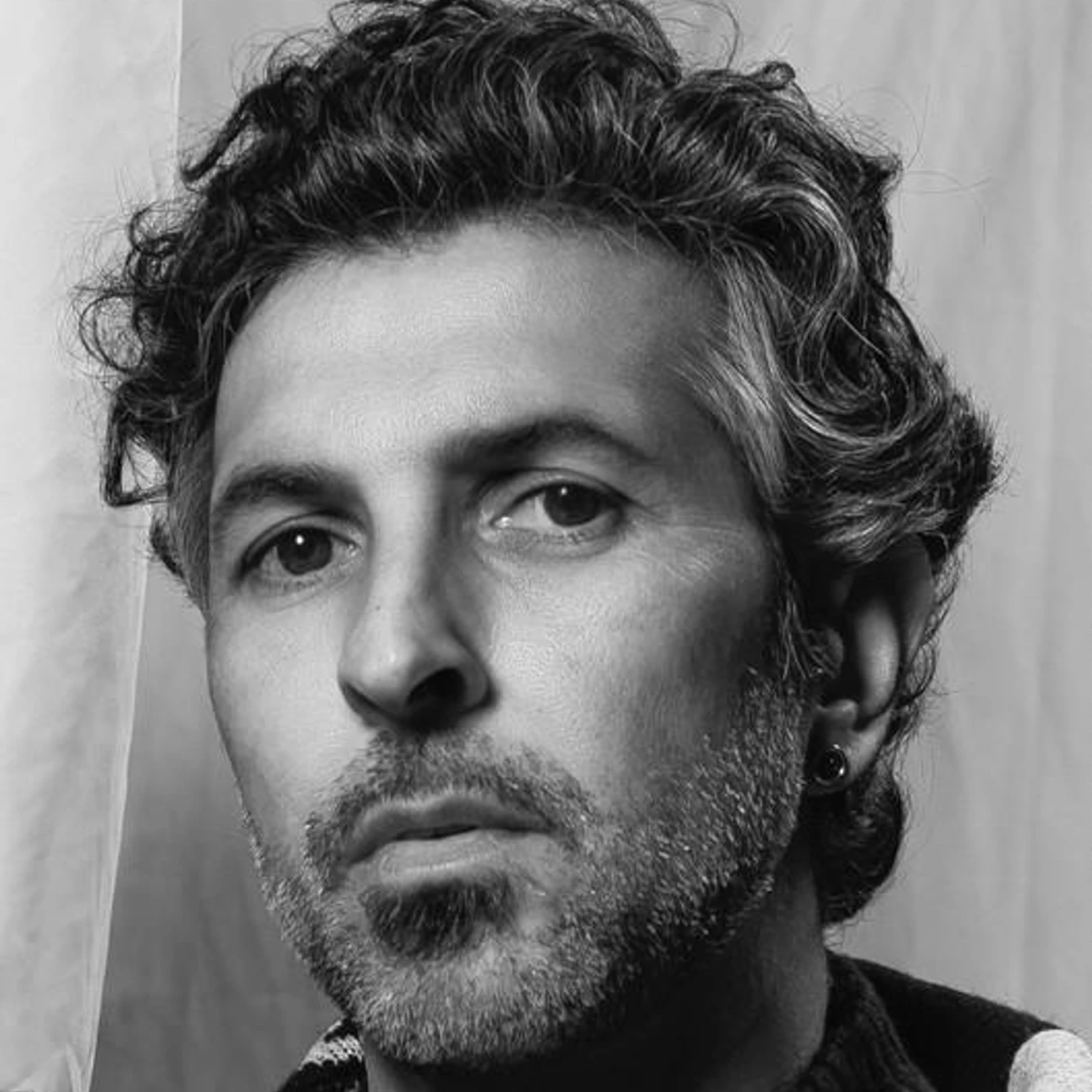 Arcángel Brand Page