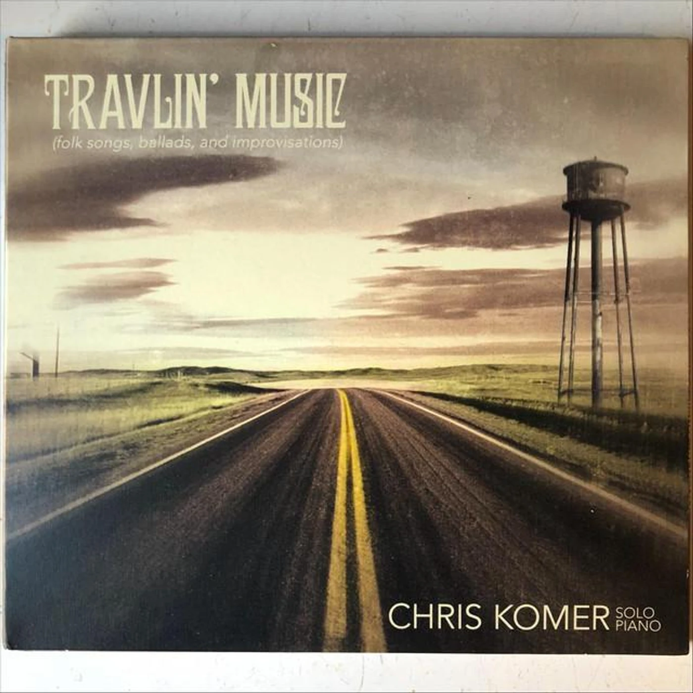 Chris Komer Brand Page